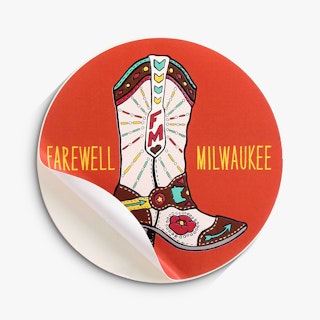 A sticker peeling off its backing and custom printed with an orange background and Farewell Milwaukee.