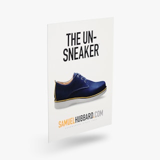 A styrene sign custom printed with The Un-Sneaker and an image of a shoe.