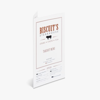 A custom take-out menu standing open and printed with Biscuit's Steakhouse and a black cow graphic.