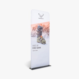A three-foot tension fabric banner printed with First Up First Down and an image of a ski boot.