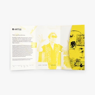 A tri-fold pocket mailer laying flat and printed with a yellow and white design for a school.
