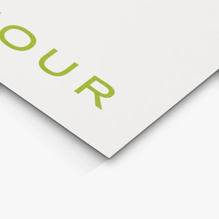 The bottom right corner of a waterproof menu printed with a white background and light green letters.
