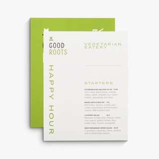 Two custom waterproof menus overlapping each other and printed with Good Roots Happy Hour in black and green.