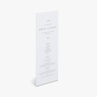 A wedding program printed with Emily & Kevin and the names of their wedding party.