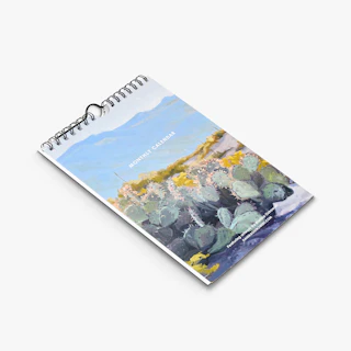 A wire coil calendar printed Monthly Calendar and a desert cactus illustration on the cover.