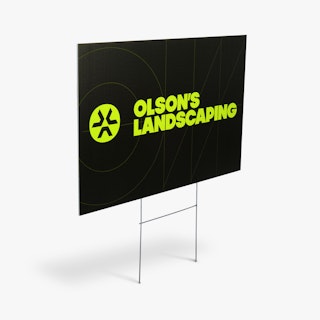 A business lawn sign and H-stake printed with Olson's Landscaping in yellow and black.